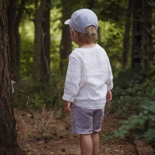 biała lniana bluzka z długim rękawem dla dziecka